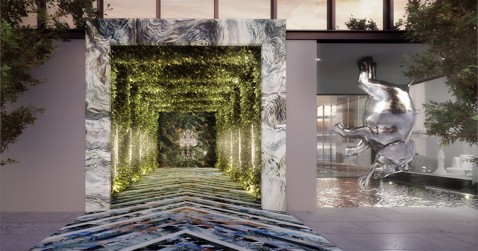 Grand arrival lobby with marble portal and verdant interior